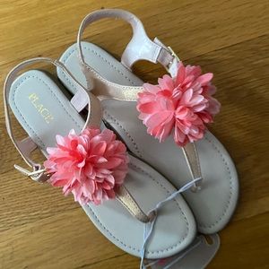 Children’s Place NWT big girls sandals.  Size 5 Melon color pouf detail.